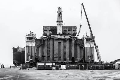 Demolishing M/V OS35 at the port of Amsterdam after being salvaged near Gibraltar,